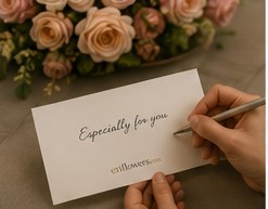 A florist writing a personal message on a gift card