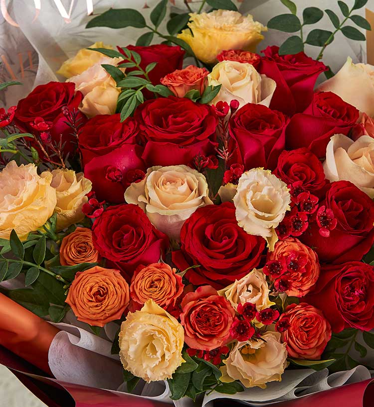 Twelve Champagne Roses & Nine-star Leaves Bouquet — alternate view